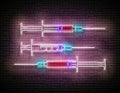 Set of Glow Medical Syringes with Blood