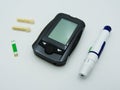 Set of glucose meter with diabetes indicator strips for blood glucose testing Royalty Free Stock Photo