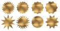 Set of gold brushed metal stars isolated on white background