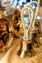 Set of gold handbells on table during concert