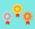 Set of gold, silver, bronze medal with star for first place. Trophy, award for winner isolated on blue background. Golden badge Royalty Free Stock Photo