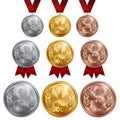 A set of gold, silver and bronze medals, the first, second and third place. Winner, champion, number one, two, three. Red ribbon. Royalty Free Stock Photo