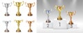 Set of gold silver and bronze trophy cup isolated or on ceremony pedestal for winner award