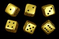 Set of golden dice with black dots isolated on black background. 3D rendered illustration Royalty Free Stock Photo