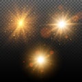 Set of golden glowing lights effects on transparent background. Star burst with sparkles