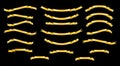 Set of golden silk ribbons on black background Royalty Free Stock Photo