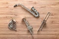 Set of golden toy brass wind orchestra instruments: saxophone, trumpet, french horn, trombone. Music concept. Royalty Free Stock Photo