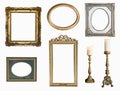 Set of golden vintage frame adn candlesticks isolated on white background.