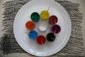Set of gouache paint pots of different colors