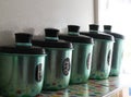 Set of green anodized antique kitchen canisters Royalty Free Stock Photo