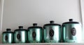 Set of green anodized antique kitchen canisters Royalty Free Stock Photo