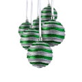 Set of green Christmas ornaments hanging over white background. Christmas tree decorations isolated on white Royalty Free Stock Photo