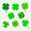 Set of green clover leaves isolated on white background