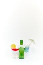 Set of green glass beer bottle and two goblets Royalty Free Stock Photo