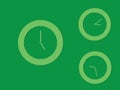 A set of green round clocks with different times on dark background Royalty Free Stock Photo