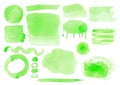 Set of green watercolor splots, strokes ans splashes. Isolated on white background.