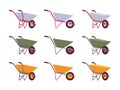 Set of grey, green, yellow wheelbarrows Royalty Free Stock Photo