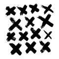 Set of 14 grunge black abstract textured vector crosses.