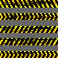 Set of grunge yellow caution tapes - isolated illustration