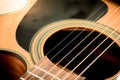 Set of guitar strings and soundhole from acoustic guitar Royalty Free Stock Photo