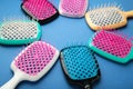 Set of hairbrushes on dark blue background. Flat lay Royalty Free Stock Photo