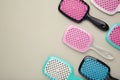 Set of hairbrushes on grey background. Flat lay Royalty Free Stock Photo