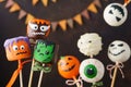 Halloween cake pops and marshmallow with funny monster faces Royalty Free Stock Photo