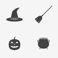 Set of Halloween monochrome icons. Witch hat, broom stick, cauldron and pumpkin.