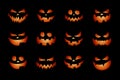 Set of Halloween scary glowing pumpkins cut silhouettes on black background Royalty Free Stock Photo