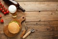 Set of hamburger beer and french fries. A standard set of drinks and food in the pub, beer and snacks. Dark background, fast food Royalty Free Stock Photo