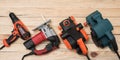 Set of hand carpentry power tools for woodworking lies on a light wooden background. Directly above Royalty Free Stock Photo