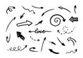 Set of hand-drawn arrows on white background. Curved, spiral, straight black pointers