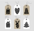 Set of hand drawn doodle scandinavian Christmas element tags. Collection winter holiday vector gift tags and bundle