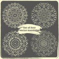 Set of 4 hand drawn mandalas. Vintage style elements with grunge