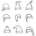 Set of hand drawn Santa hats. Festive design element for Christmas and New Year. Vector illustration Royalty Free Stock Photo