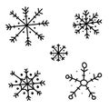 Set of hand drawn snowflake isolated on white background. Vector doodle illustration for New Year, X-mas decoration Royalty Free Stock Photo