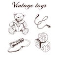 A set of hand-drawn vintage toys: teddy bear, skipping rope, spyglass, blocks. Outline vintage vector illustration. Royalty Free Stock Photo