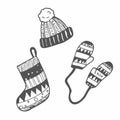 Set of hand drawn winter clothes and accessories hat, mittens, socks. Doodle sketch for kids, Christmas design. Isolated vector Royalty Free Stock Photo