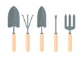 A set of hand garden tools. Weeder, rake, spades and fork isolated on a white background Royalty Free Stock Photo