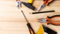 Set of hand tools on wooden table. Instruments on wooden background. Repair tools. Top view Royalty Free Stock Photo