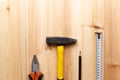 Set of hand tools on wooden table. Instruments on wooden background. Repair tools. Top view. Flat lay. Close-up Royalty Free Stock Photo