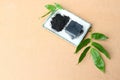 Set of handmade bamboo charcoal glycerin soaps on wooden background