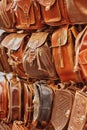 Set of handmade leather bags for sale in shop in Royalty Free Stock Photo