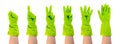 Set of hands in green protective rubber gloves isolated Royalty Free Stock Photo