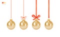 Set of Hanging Christmas Toys. Traditional Christmas Tree Toy - Shiny Gold Ball hanging on a red thread, on a ribbon, with a bow. Royalty Free Stock Photo