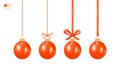 Set of Hanging Christmas Toys. Traditional Christmas Tree Toy - Shiny Red Ball hanging on a red thread, on a ribbon, with a bow. Royalty Free Stock Photo