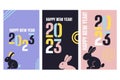 2023 set of Happy New Year posters with rabbit. Abstract geometric typography design