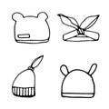 Set of hats for children in line, doodle style on an isolated white background. Hand drawn black outline. Vector illustration Royalty Free Stock Photo