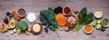 Set of healthy food ingredients. Above view table scene on a wooden banner background. Royalty Free Stock Photo