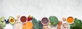 Healthy super food ingredients. Top view bottom border on a white banner background. Copy space. Royalty Free Stock Photo